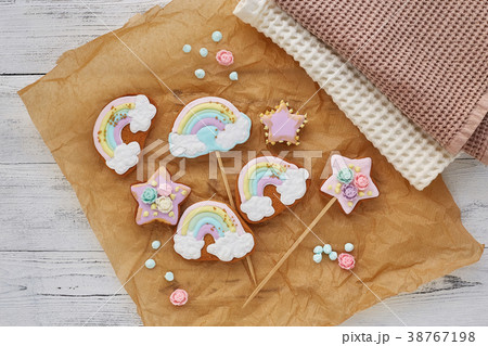 Colorful cookies on white wooden background 38767198