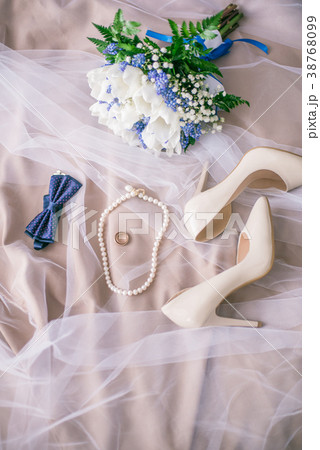 Bride's bouquet of white tulips and blue flowers 38768099