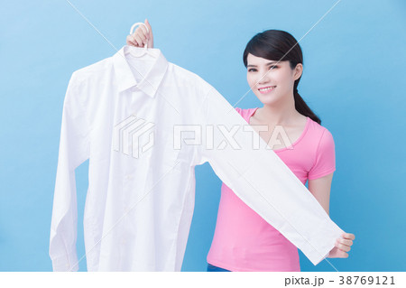 housewife take clean shirt 38769121