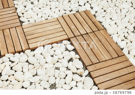 wooden foot pavement withwhite pebble stone wooden foot pavement withwhite pebble stone 38769796