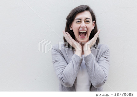 wow and surprise emotion from beautiful woman 38770088