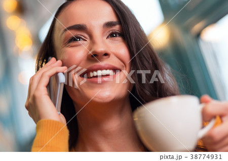 Adorable beautiful woman answering call 38774931