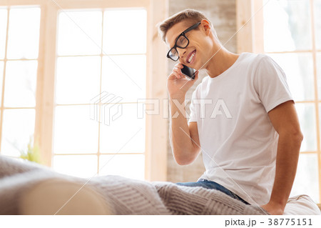 Happy teenager talking on the phone 38775151