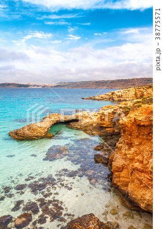 Rocky coast of the Comino island. Rocky coast of the Comino island. 38775571