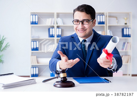 Laywer with diploma roll in legal profession Laywer with diploma roll in legal profession 38782197
