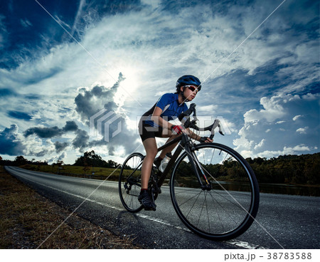 Woman cycling road bike outdoor exercise 38783588