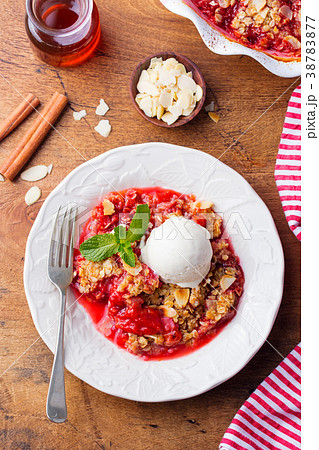 Crumble with berries, fruits, vanilla ice cream Crumble with berries, fruits, vanilla ice cream 38783877