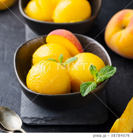 Mango, peach ice cream, tropical fruit sorbet Mango, peach ice cream, tropical fruit sorbet 38784076