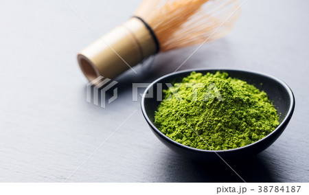 Matcha, green tea powder in bowl with bamboo whisk 38784187