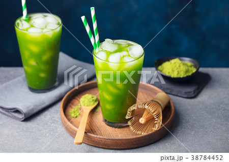 Matcha, green tea ice tea in tall glass Copy space 38784452