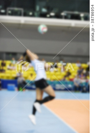 Blurred female volleyball player 38786954