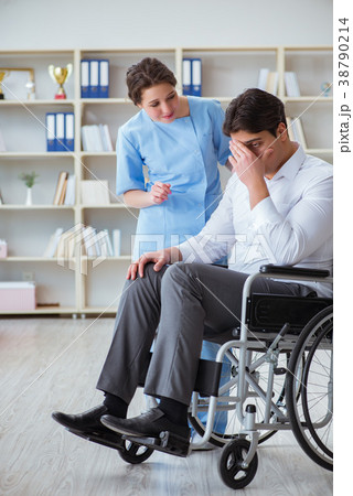 Disabled patient on wheelchair visiting doctor for Disabled patient on wheelchair visiting doctor for 38790214