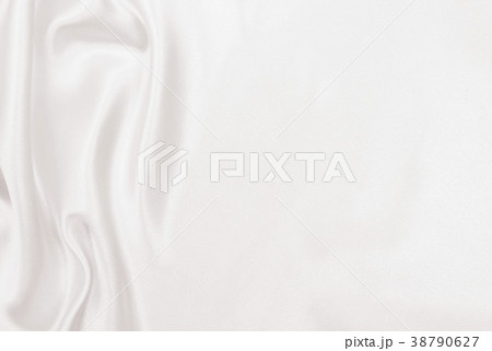 Smooth elegant golden silk or satin luxury cloth Smooth elegant golden silk or satin luxury cloth 38790627