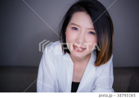 beautiful asian woman white shirt with thinking beautiful asian woman white shirt with thinking 38793165