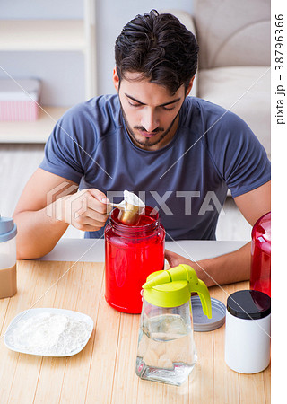 Athlete tasting new protein supplements for better 38796366