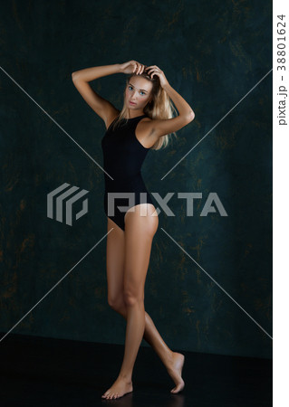 Cute swimmer girl in closed black swimsuit 38801624