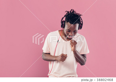 African-American man in headphones listening to African-American man in headphones listening to 38802468