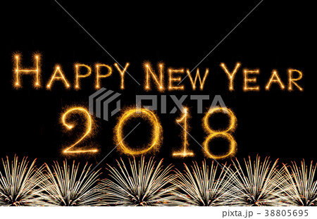 Happy new year 2018 written with Sparkle firework on fireworks with dark background, celebration and greeting cards concept Happy new year 2018 written with Sparkle firework on fireworks with dark background, celebration and greeting cards concept 38805695