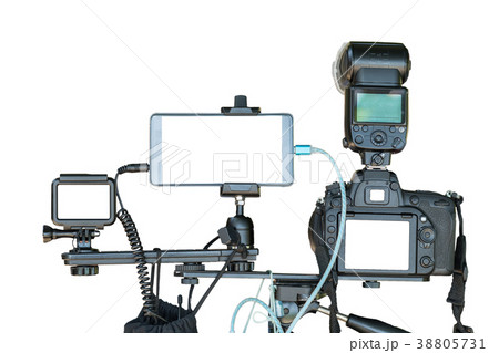 Professional set of digital camera with smart mobile phone and action camera on tripod over white background, Camera for photographer or Video, Live Streaming equipment concept, include clipping path Professional set of digital camera with smart mobile phone and action camera on tripod over white background, Camera for photographer or Video, Live Streaming equipment concept, include clipping path 38805731