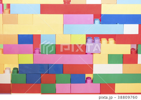 Colorful stacked toy plastic building blocks 38809760