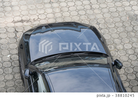 black car Top view of parking lane black car Top view of parking lane 38810245