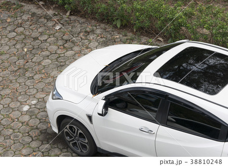 car from above in the parking area of a top view 38810248