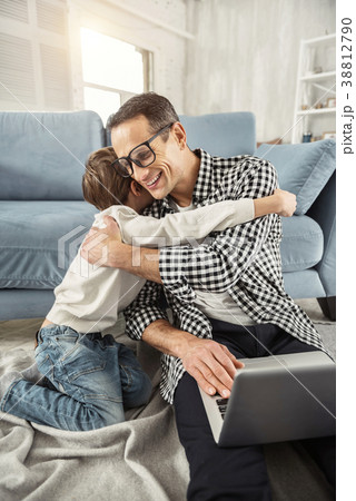 Happy daddy hugging his little son Happy daddy hugging his little son 38812790