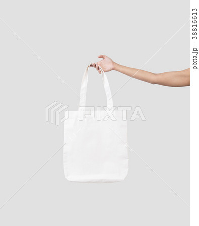 hand holding bag canvas fabric for mockup template 38816613