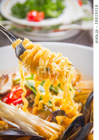 noodles with meat in soup 38819318