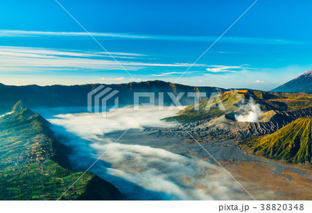 Mount Bromo during sunrise with flowing fog 38820348