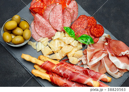 Cold smoked meat plate with pork chops, prosciutto 38820563