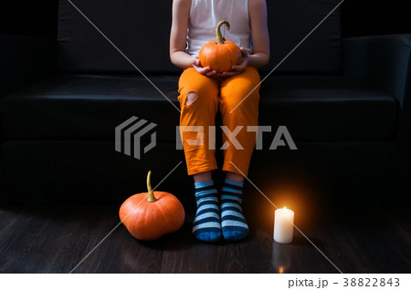 Kid with pumpkin on hand, Halloween background, 38822843