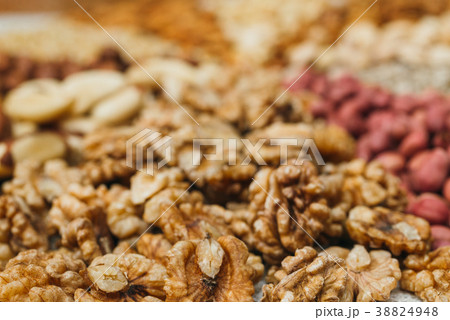 Nuts mix in a canvas bag in table. Nuts mix in a canvas bag in table. 38824948