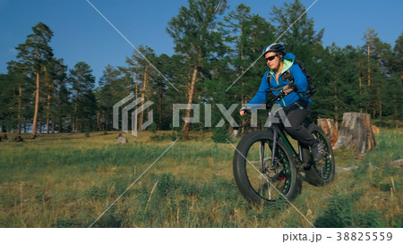 Fat bike also called fatbike or fat-tire bike in Fat bike also called fatbike or fat-tire bike in 38825559