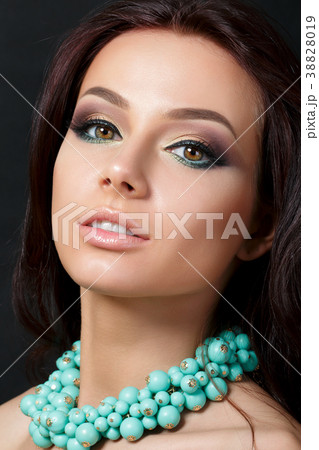 Portrait of young beautiful woman 38828019