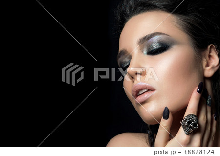 Beautiful woman touching her face 38828124