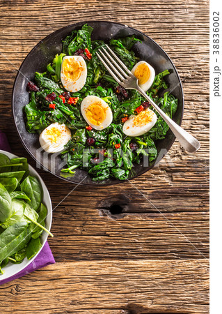 Spinach Salad. Fresh spinach salad with eggs. 38836002