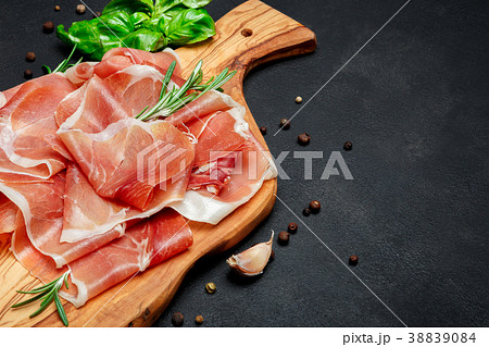 Italian prosciutto crudo or spanish jamon. Raw ham Italian prosciutto crudo or spanish jamon. Raw ham 38839084
