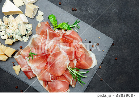Italian prosciutto crudo or spanish jamon and Italian prosciutto crudo or spanish jamon and 38839087
