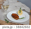 A atlantic salmon and glass of white wine 38842602