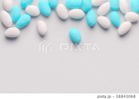 top view of blue, pink and white almond candies top view of blue, pink and white almond candies 38843068