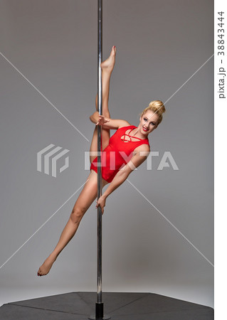 beautiful pole dancer in red bodywear on pylon beautiful pole dancer in red bodywear on pylon 38843444