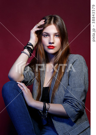 beautiful girl in jacket with red lips 38843579