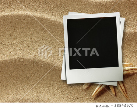 Picture frame on shells and sand background Picture frame on shells and sand background 38843970