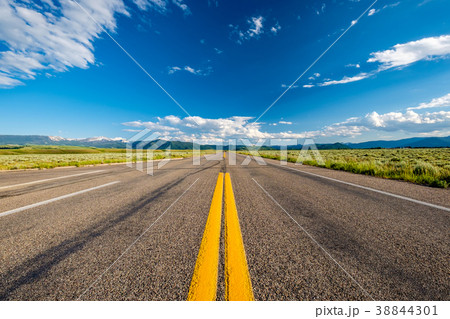 Empty open highway in Wyoming 38844301