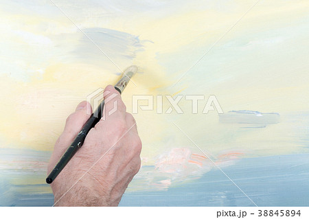 An artist painting in studio An artist painting in studio 38845894