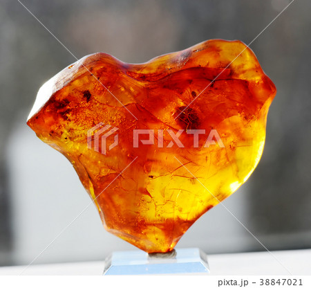 Orange translucent Baltic amber 38847021