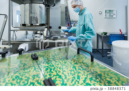 Pharmaceutical industry man worker in protective 38848371