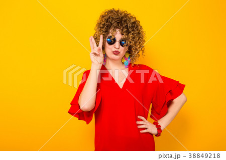 Attractive woman with short curly hair Attractive woman with short curly hair 38849218