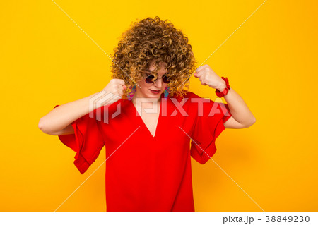 Attractive woman with short curly hair Attractive woman with short curly hair 38849230